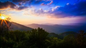 Custom home with large windows overlooking the Smoky Mountains, showcasing a layout designed for mountain views in East Tennessee.